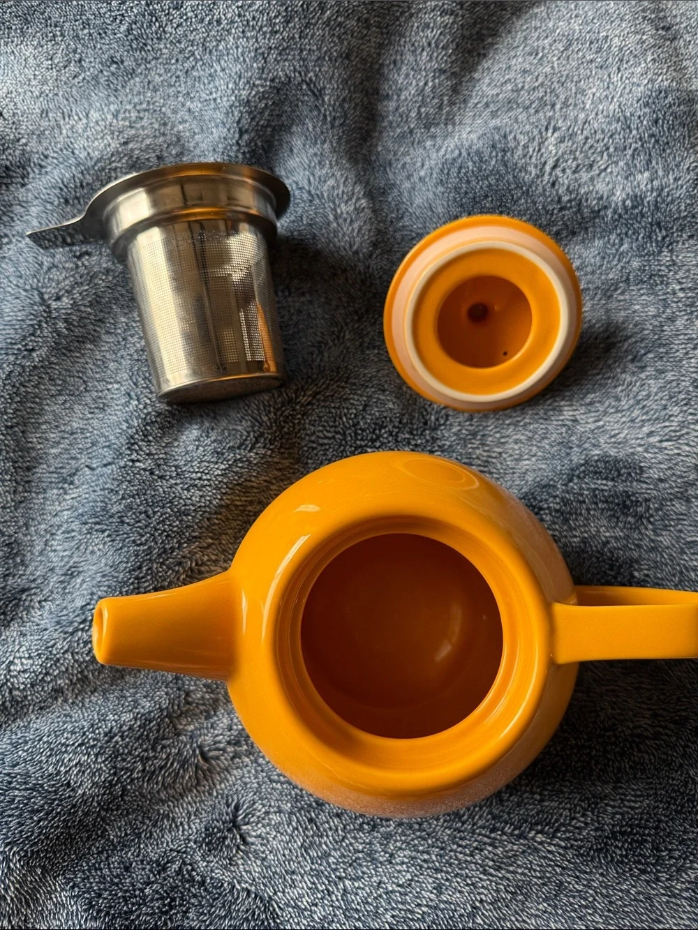 Bright Orange Ceramic Teapot with Round Silhouette